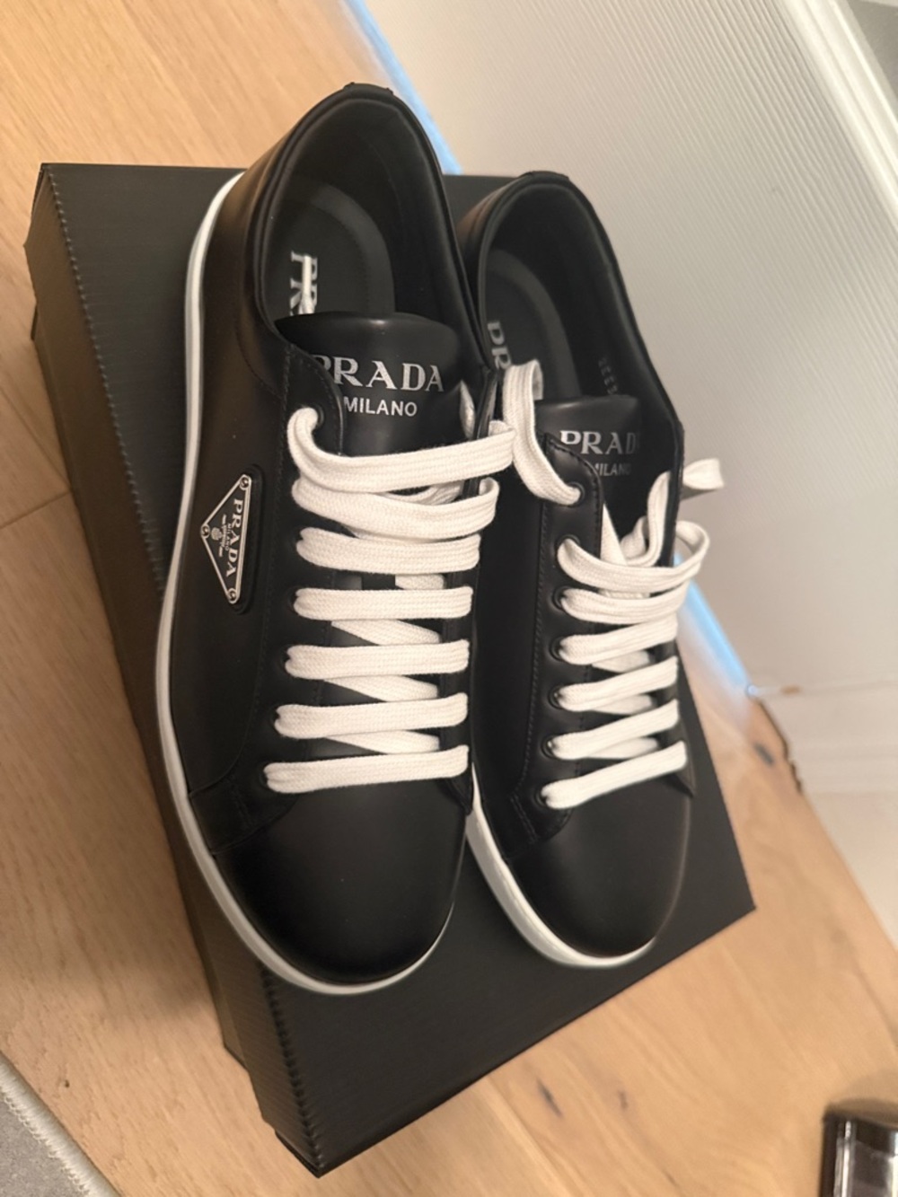 Prada Black Leather Low-Top Sneakers with White Accents new with box